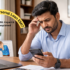 Indian borrower checking phone after missing personal loan EMI payment
